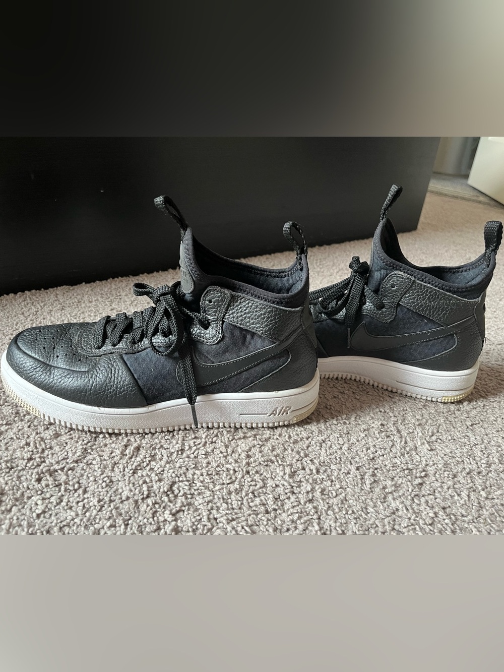 Nike Women’s Black and White Mid-Top Sneakers